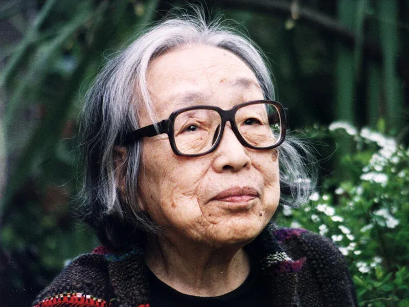 Portrait of Misao Jo, the founder of SAORI, in a garden