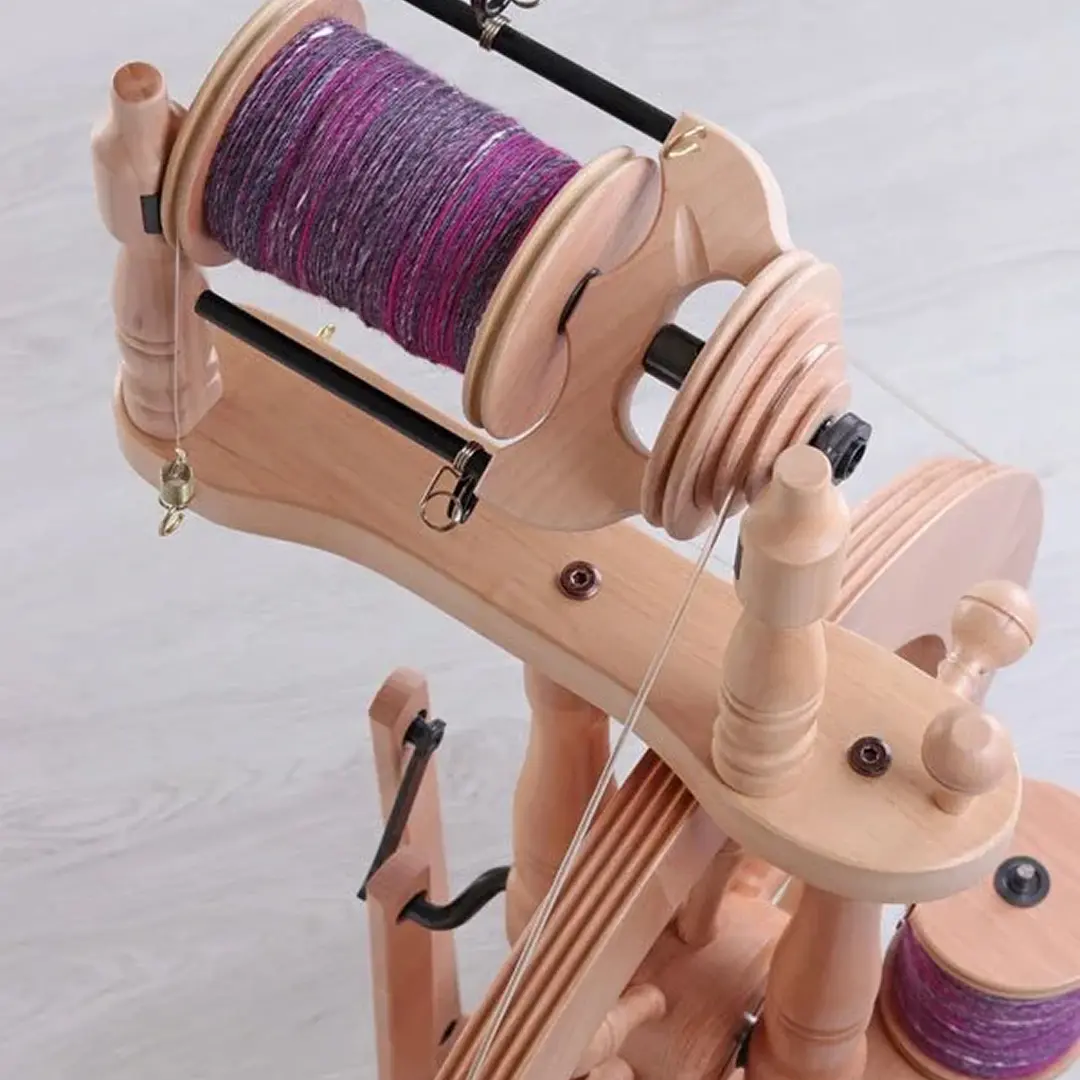 Handspun yarn on a spinning wheel bobbin